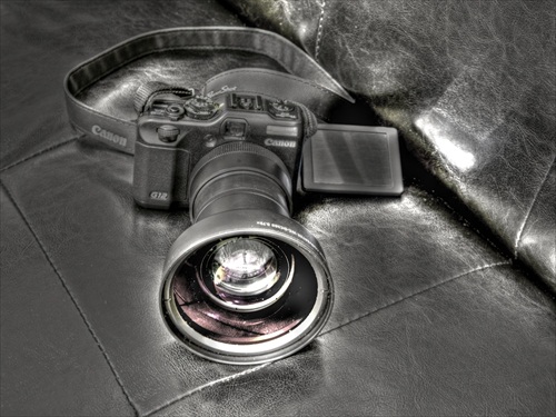 Canon Powershot G12    I.