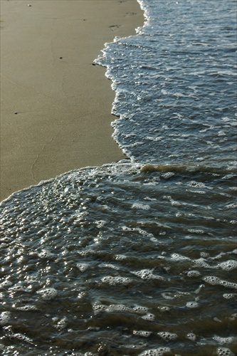 More, pláž. stopy.....